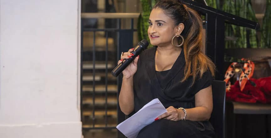 woman holding microphone