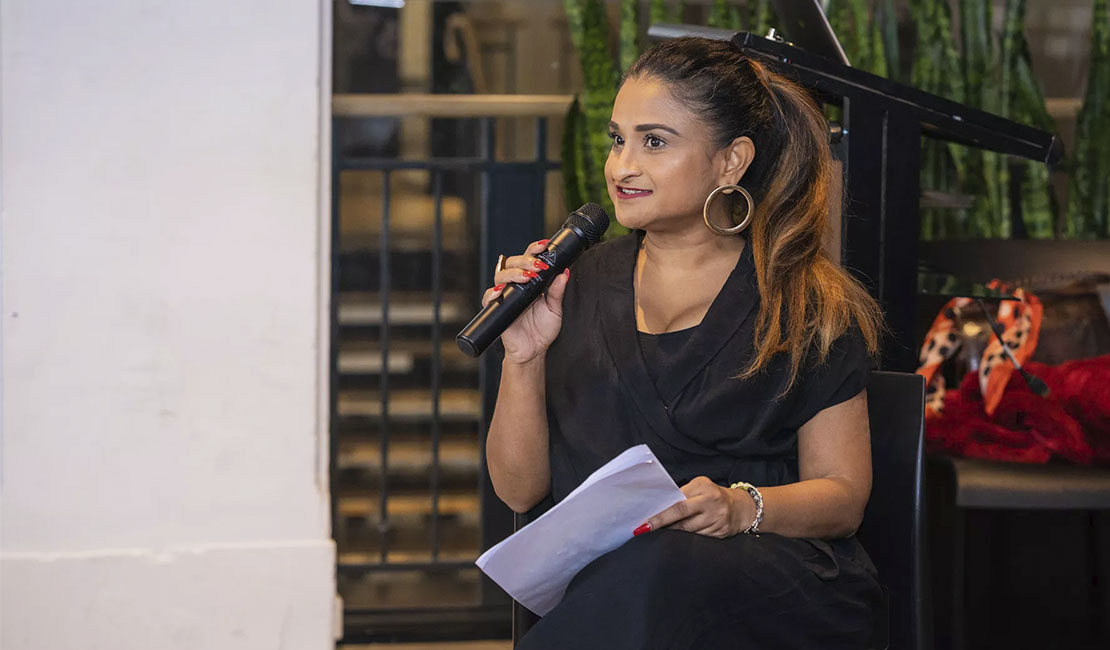 woman holding microphone