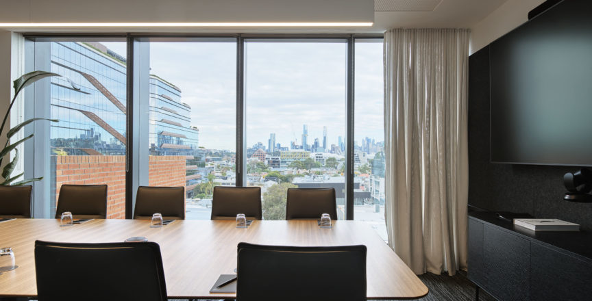 Boardroom with chairs and TV screen
