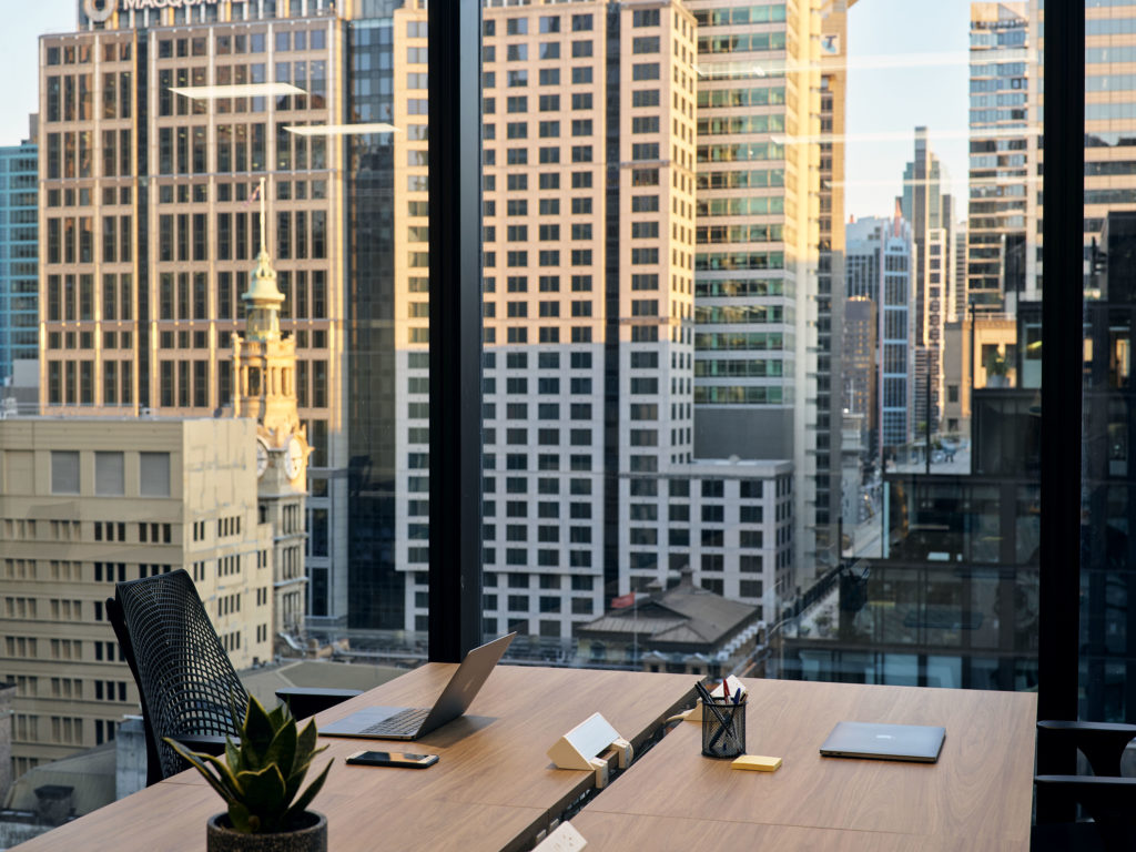 office window with view of Sydney city skyline