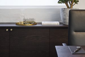 closeup of water glasses in meeting room