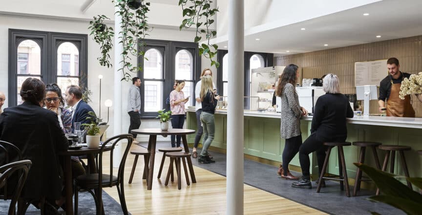 cafe with people standing near counter