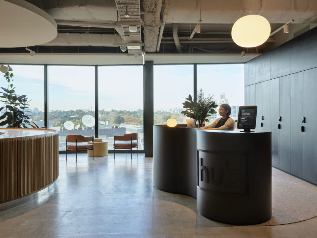 Concierge at modern desk at Hub Flinders Street