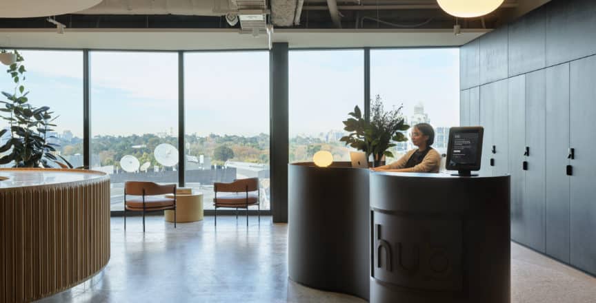 Concierge at modern desk at Hub Flinders Street