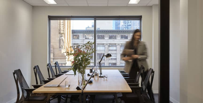 Woman walking out of an office
