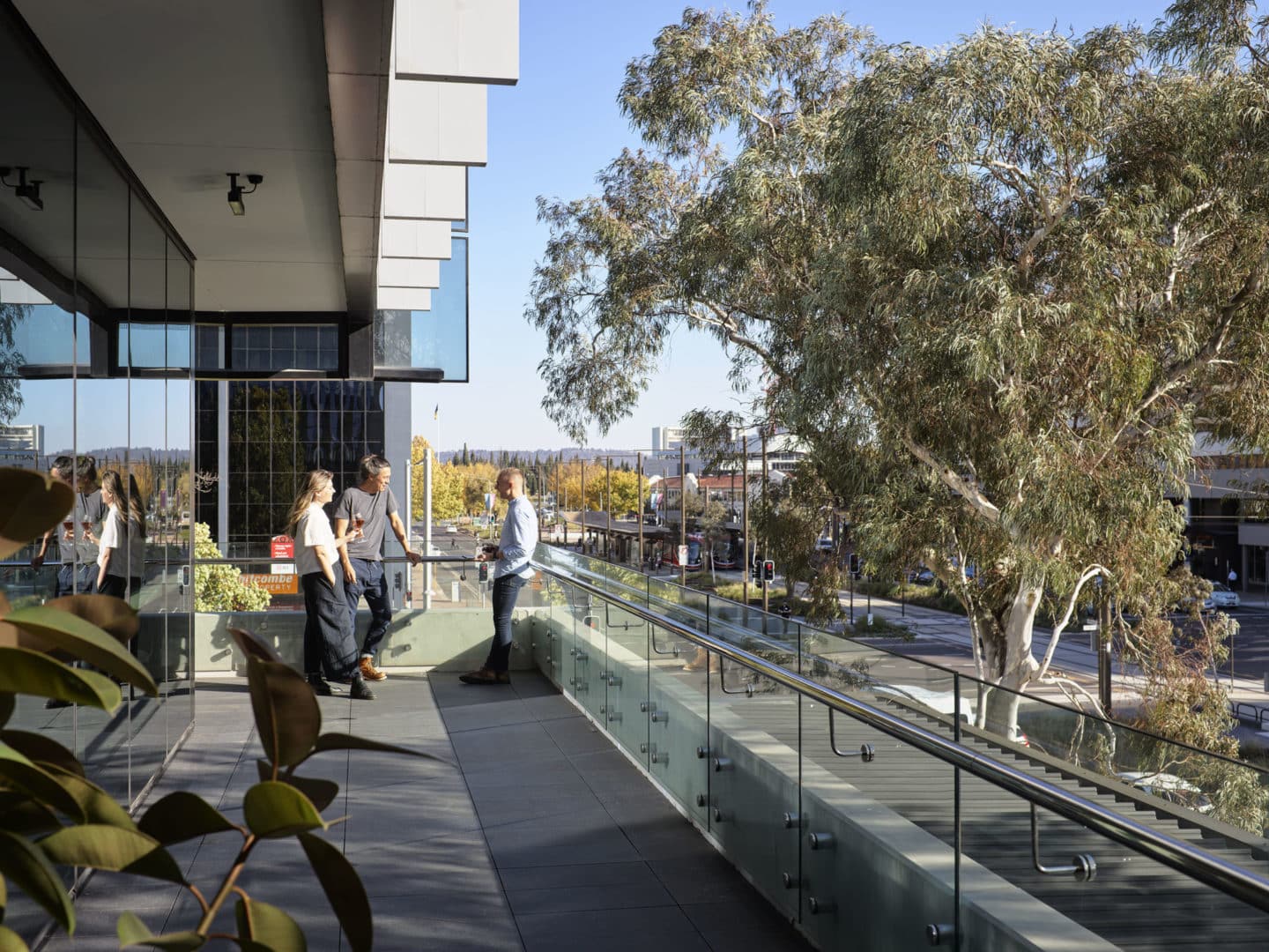 Balcony overlooking trees and street at Hub Civic Quarter