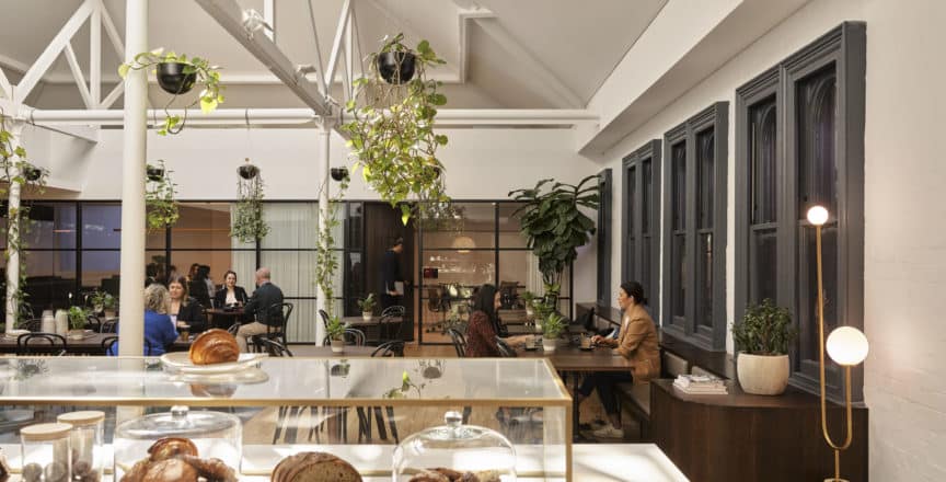 people working in a cafe