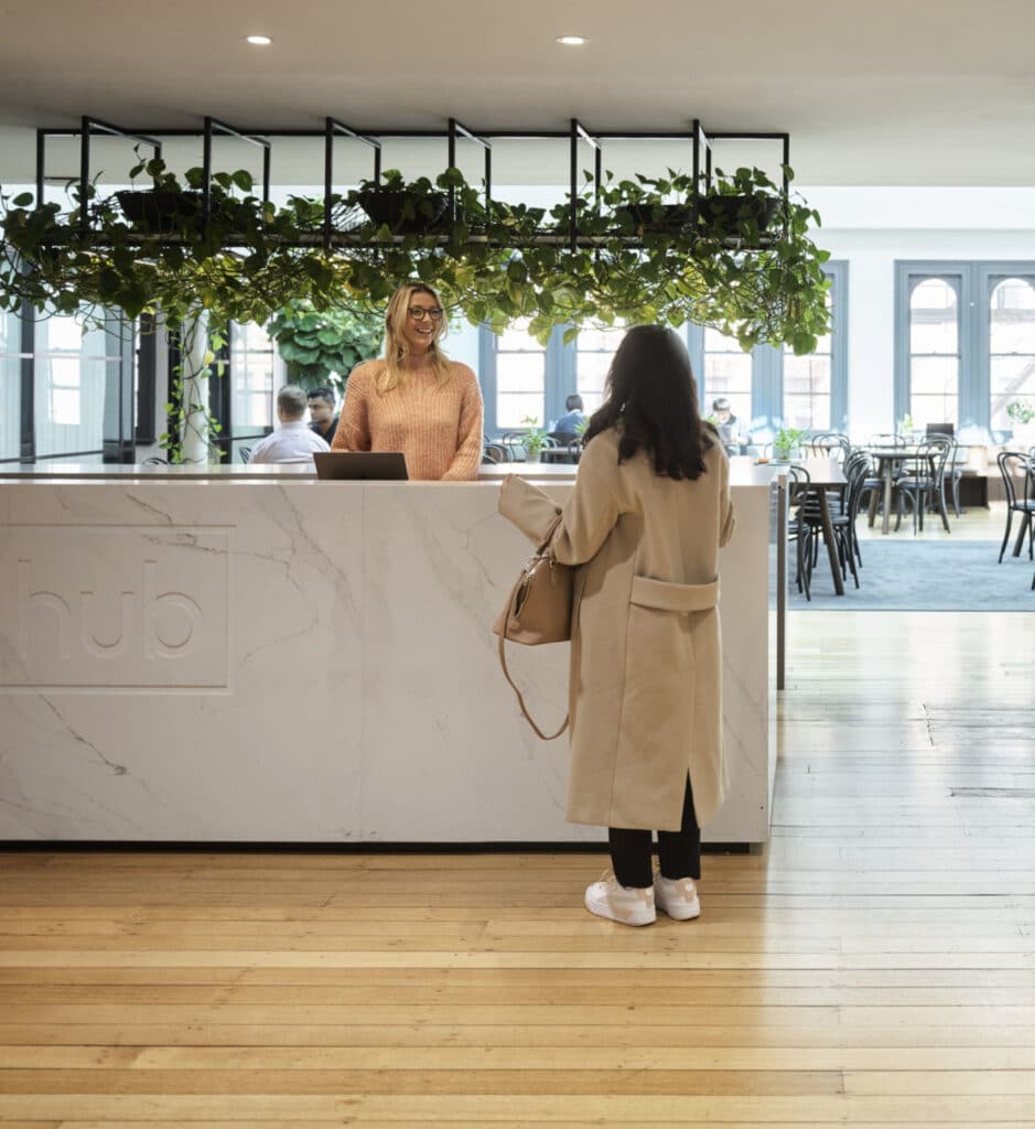 Concierge at modern desk at Hub Collins Street