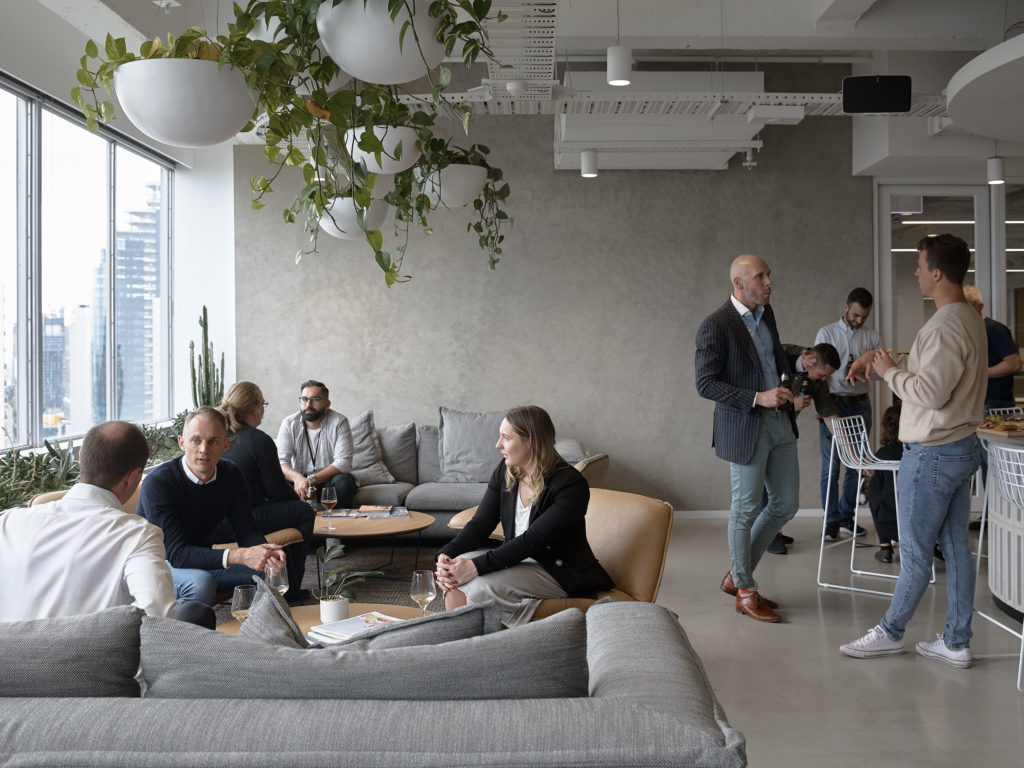people sitting in an office building cafe
