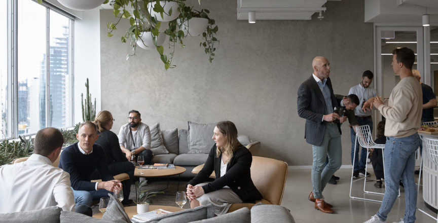 people sitting in an office building cafe