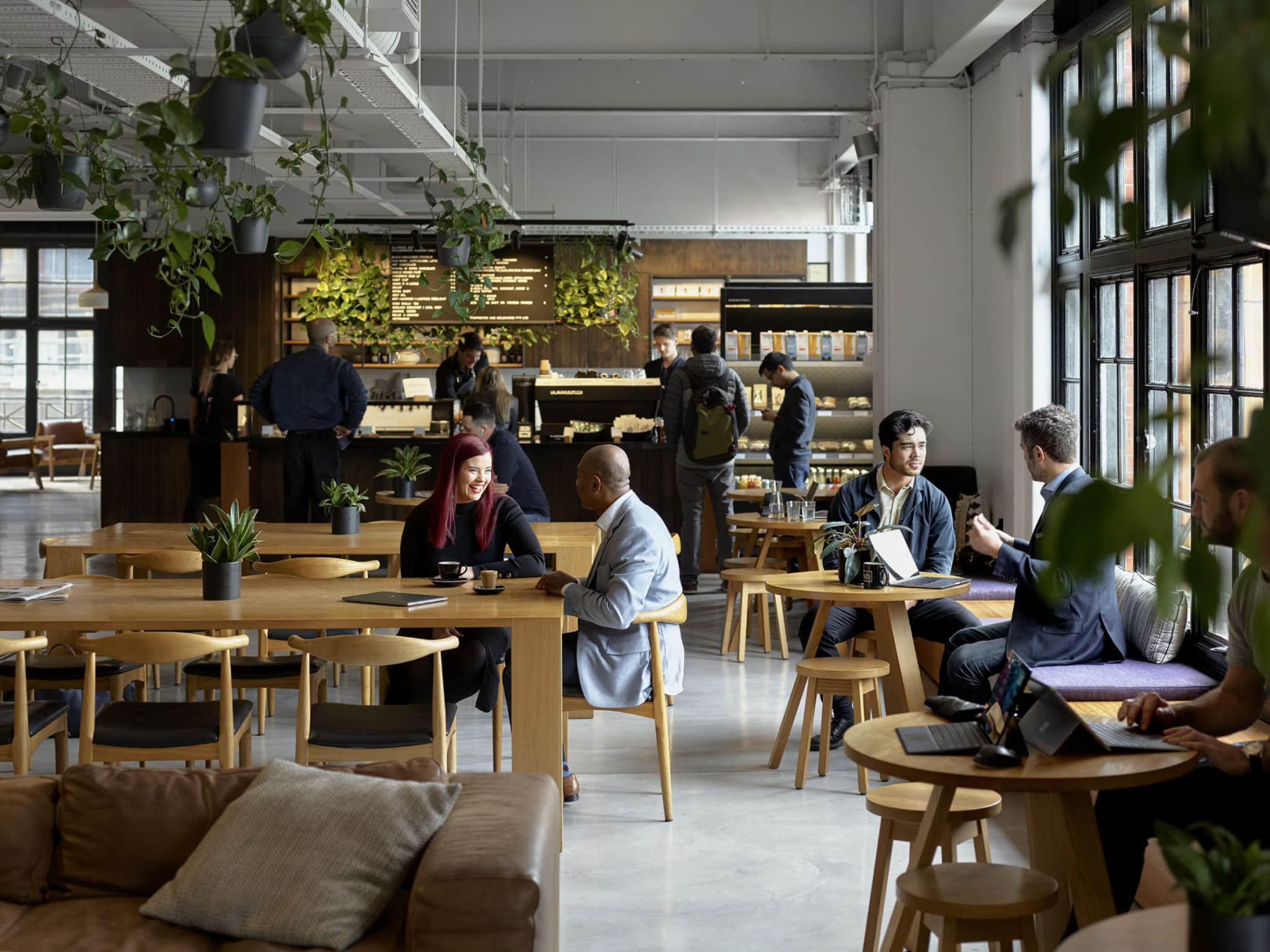 people working in a cafe