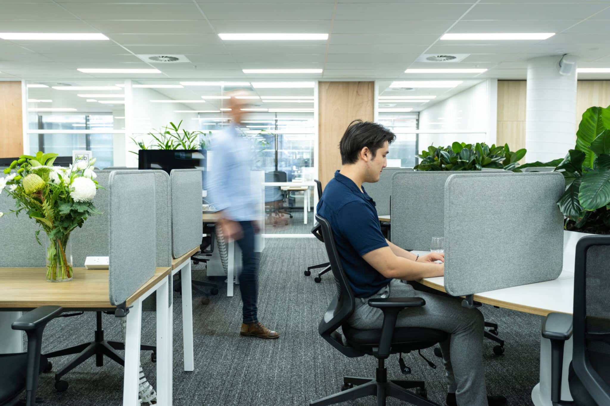 man working on desk space