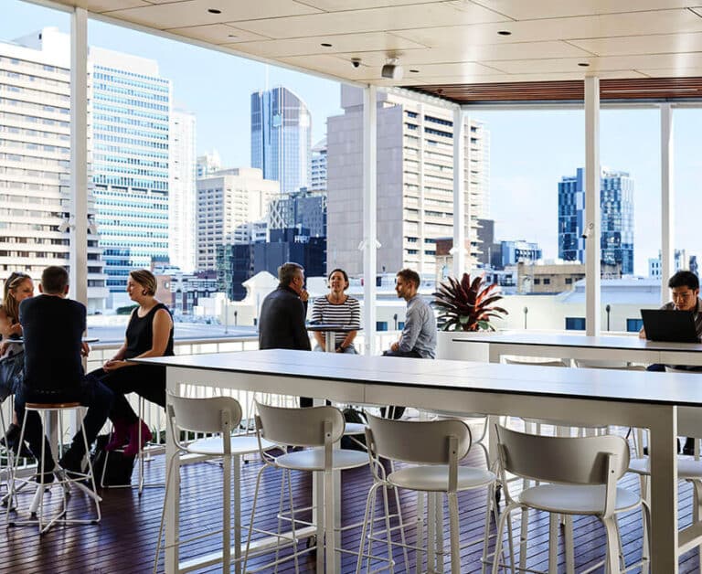 People working on the rooftop of a building in Brisbane