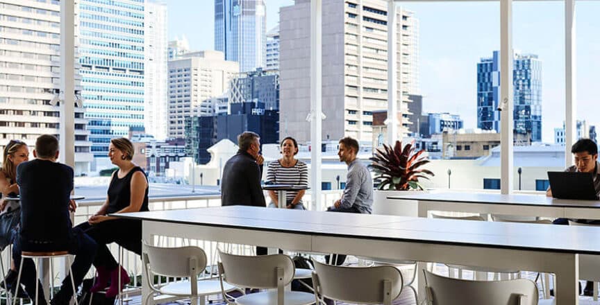 People working on the rooftop of a building in Brisbane