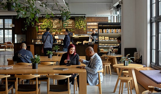 Hub southern cross cafe area with people drinking coffee