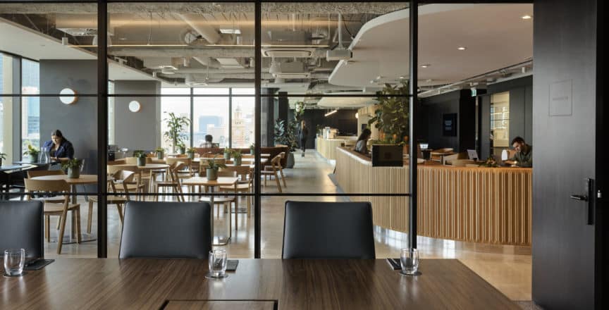 Boardroom table with view of office space