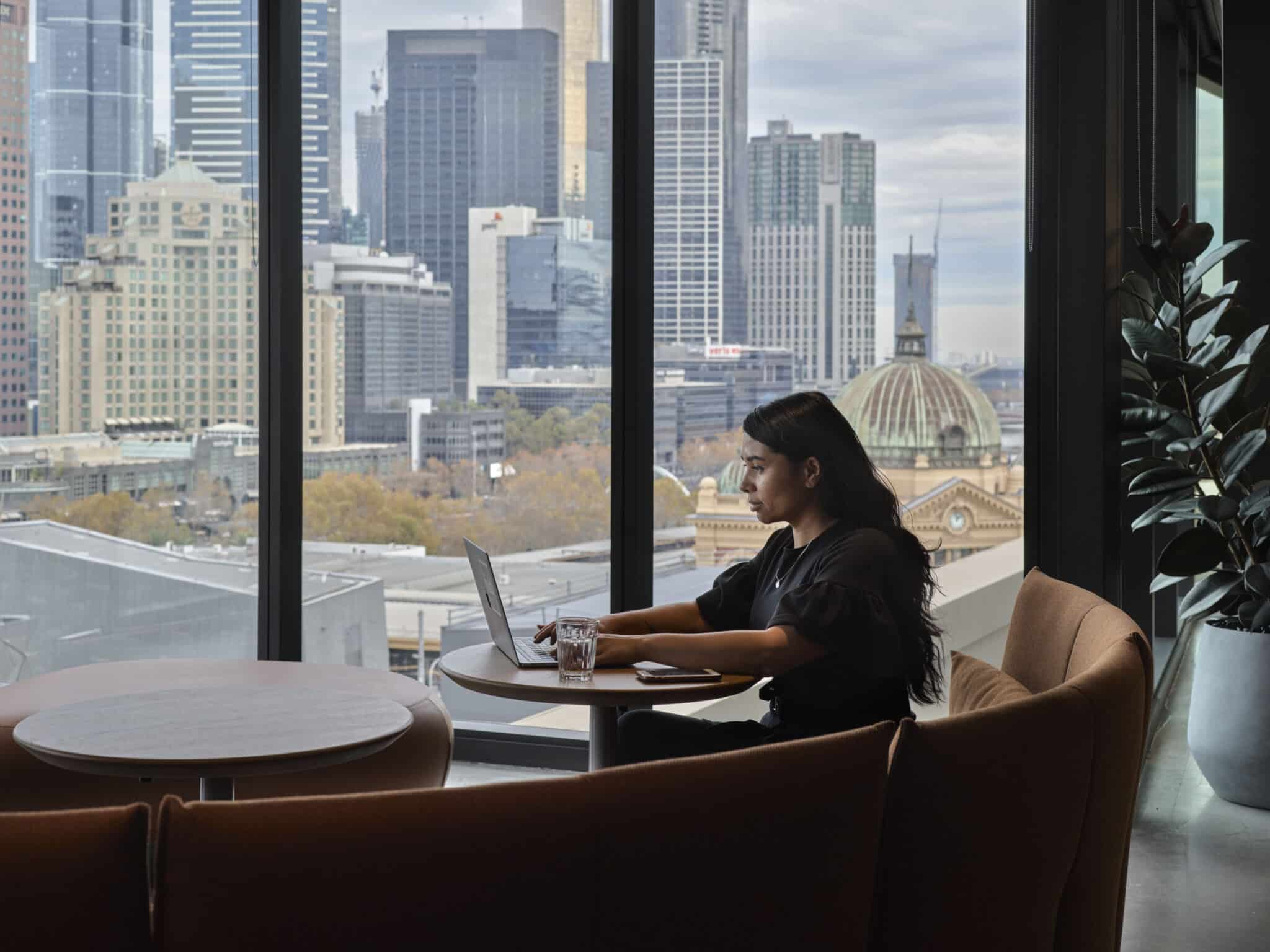 woman sitting in coworking space