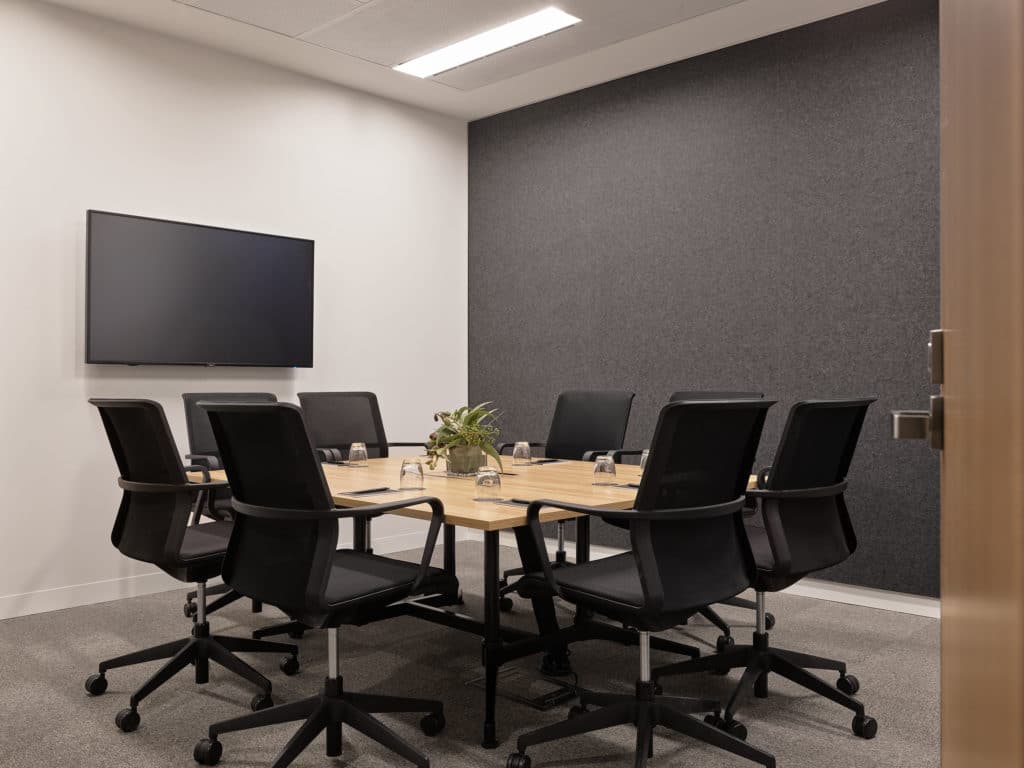meeting room with chairs and tv screen