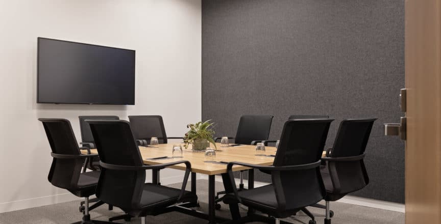 meeting room with chairs and tv screen