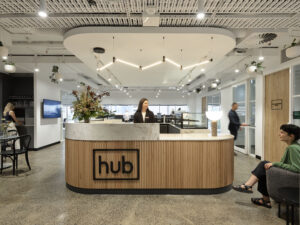 Welcome desk at Hub St Kilda Road with two people