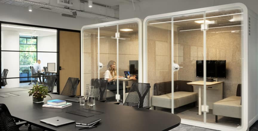 two women in a meeting pod