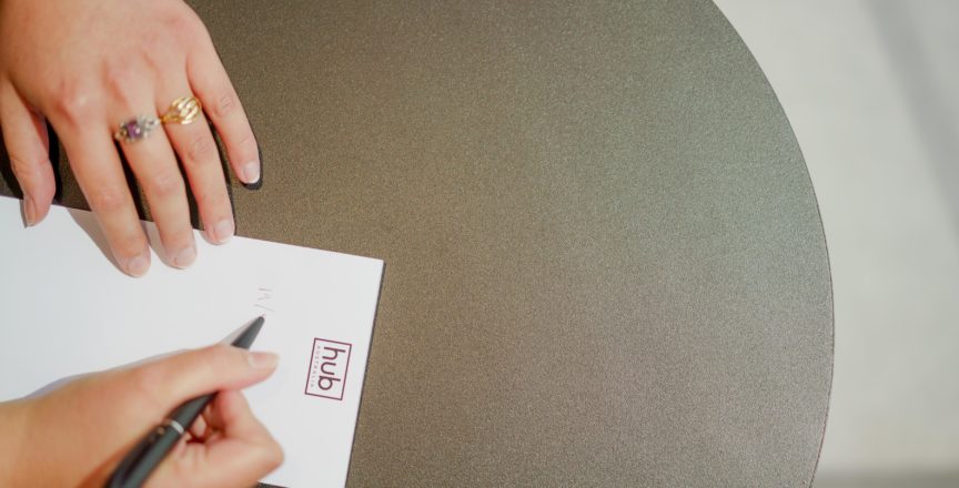 hand writing on notebook