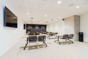 meeting room with tables and chairs