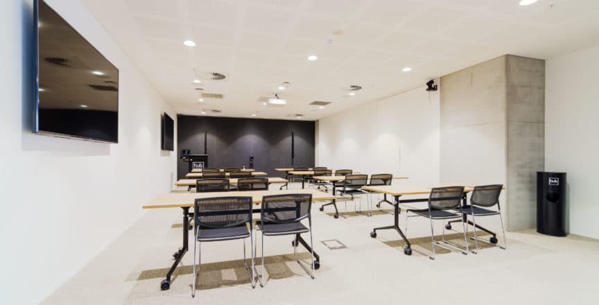 meeting room with tables and chairs