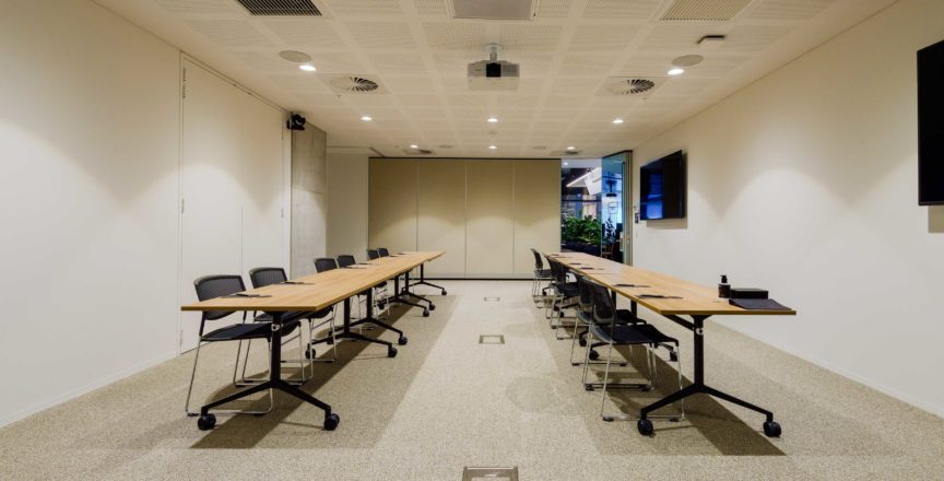 workshop room with tables and chairs
