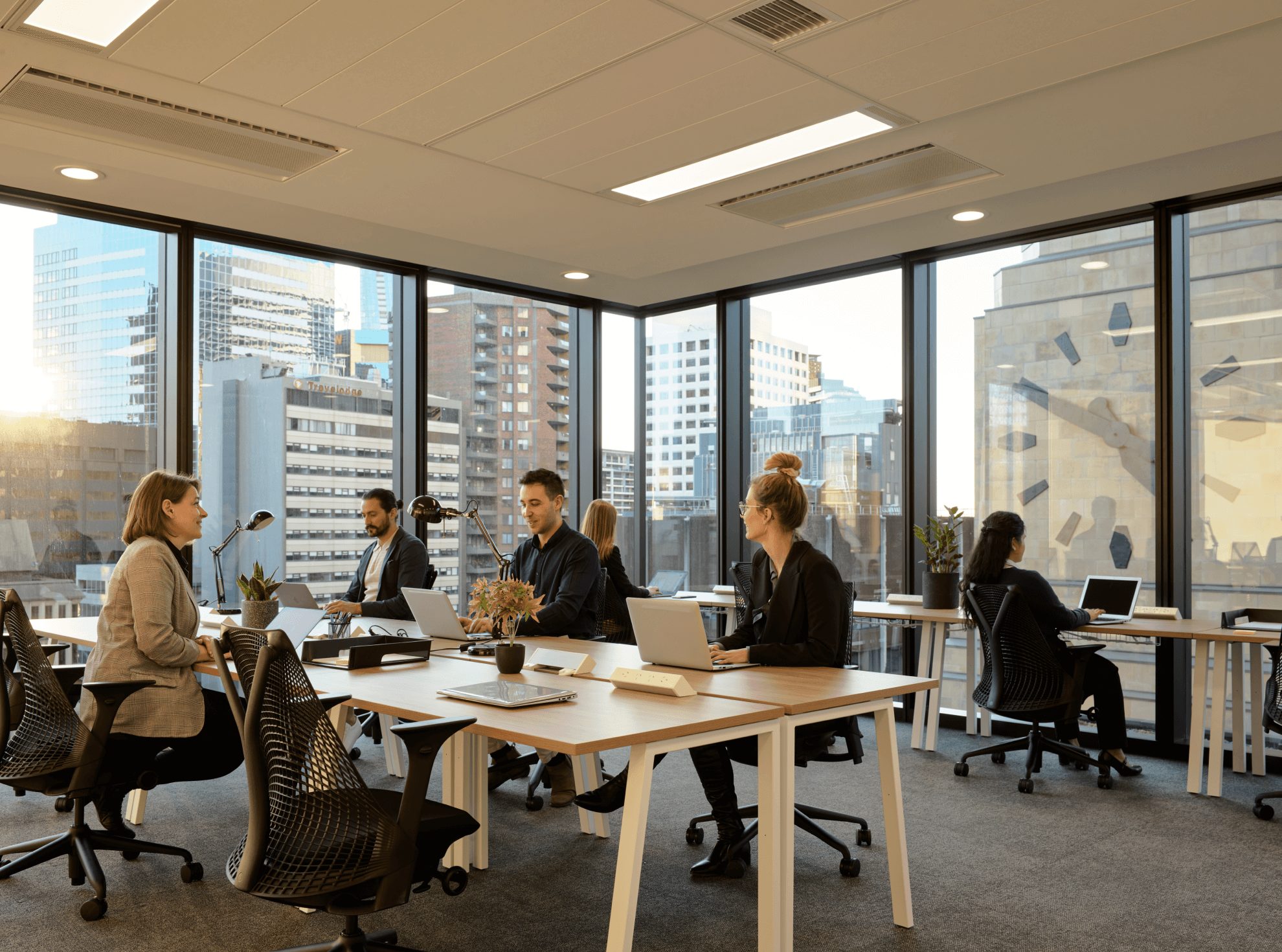 employees sitting in an office space