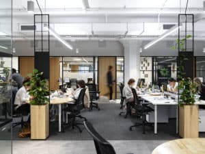 people working in a flexible office space