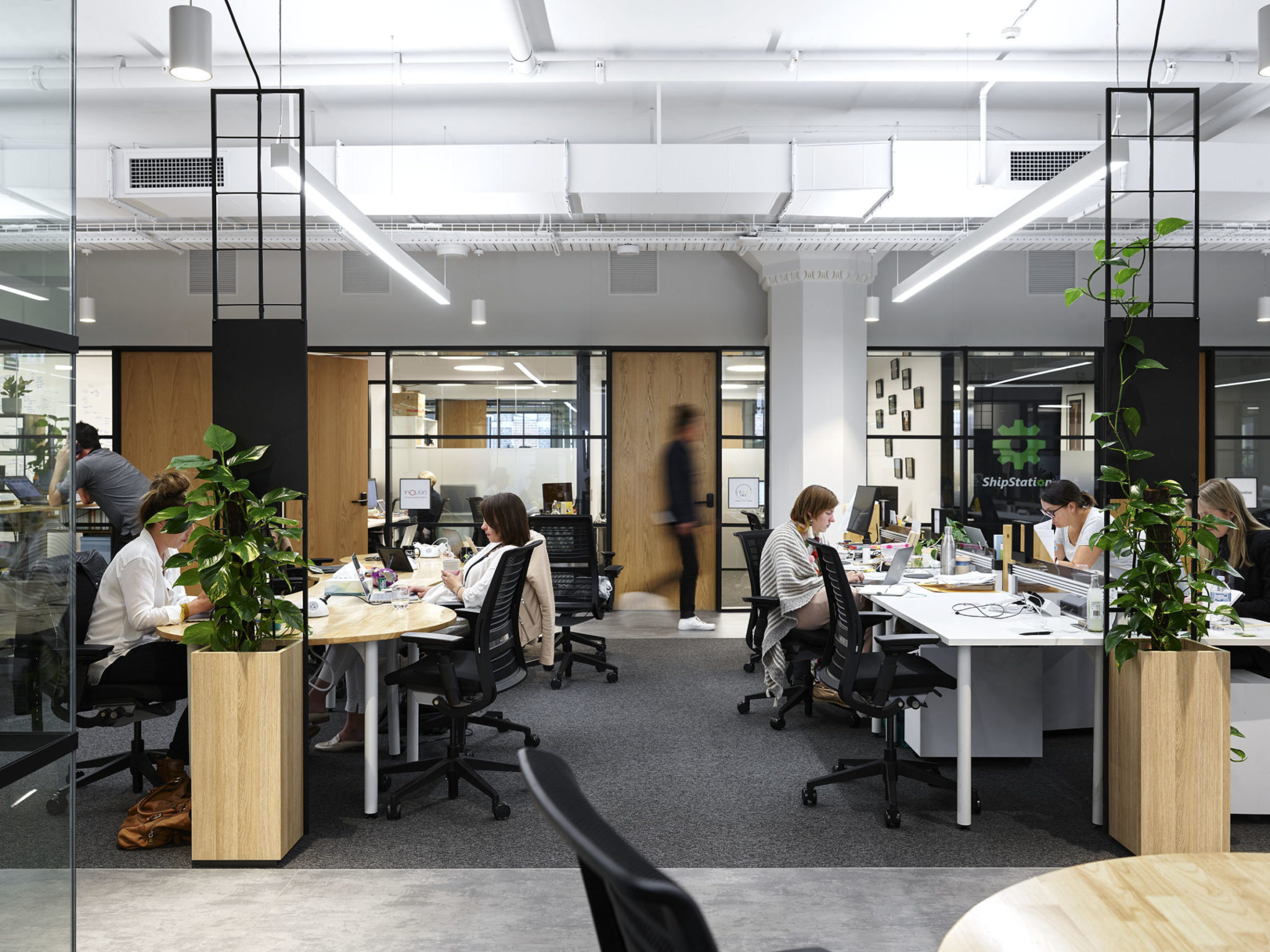 people working in a flexible office space
