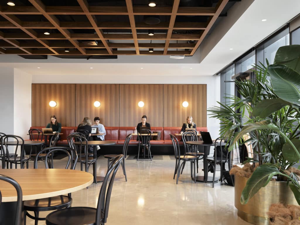 People sitting in a café worki