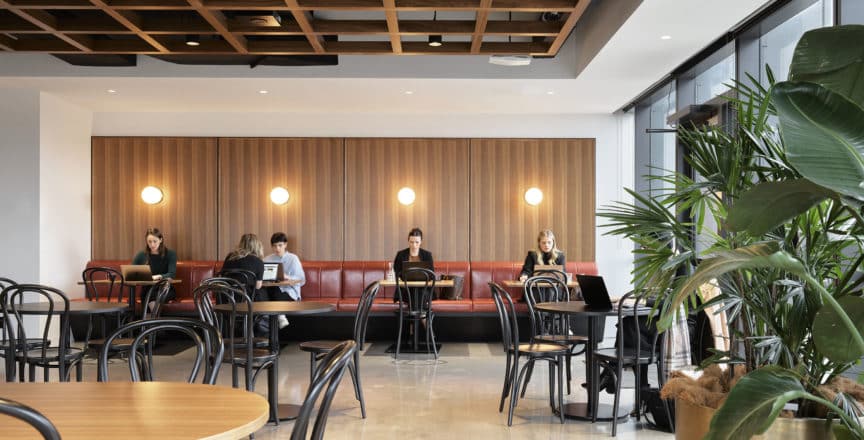 People sitting in a café worki