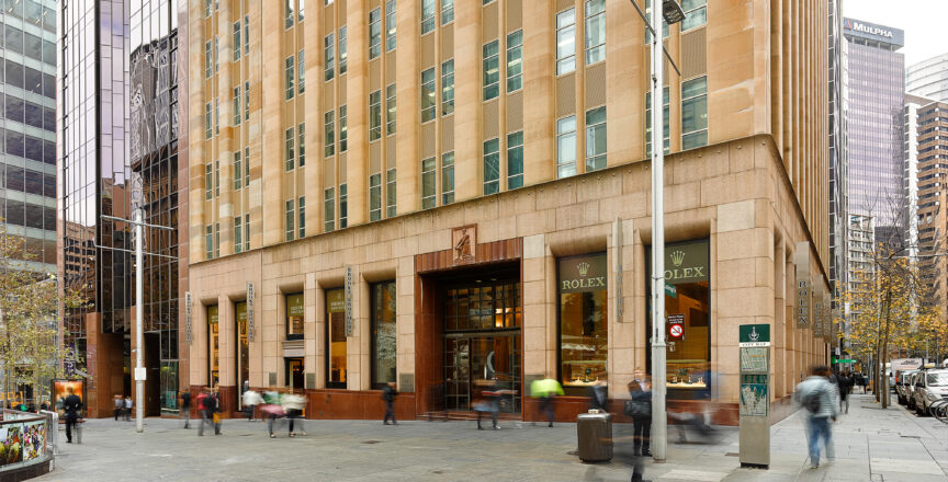 A photo of the outside of Hub Martin Place. There is a walkway and a shot of the Rolex store.