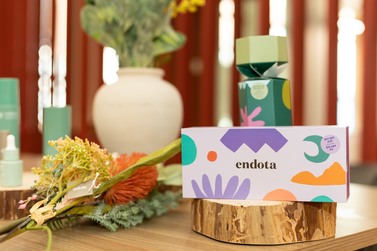 endota products on a wooden desk